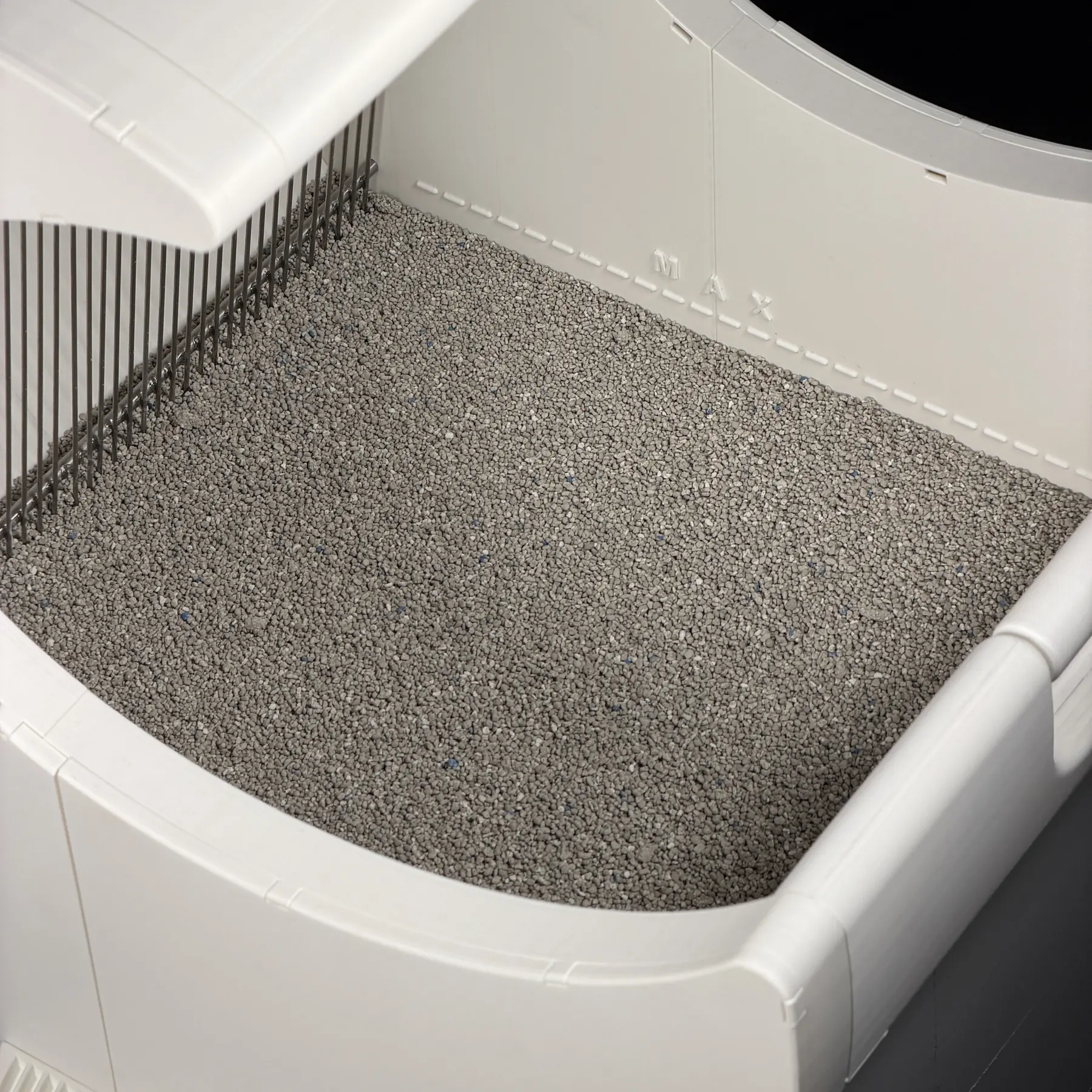 Litter floor and internal grill inside the MoonBox Litter Box